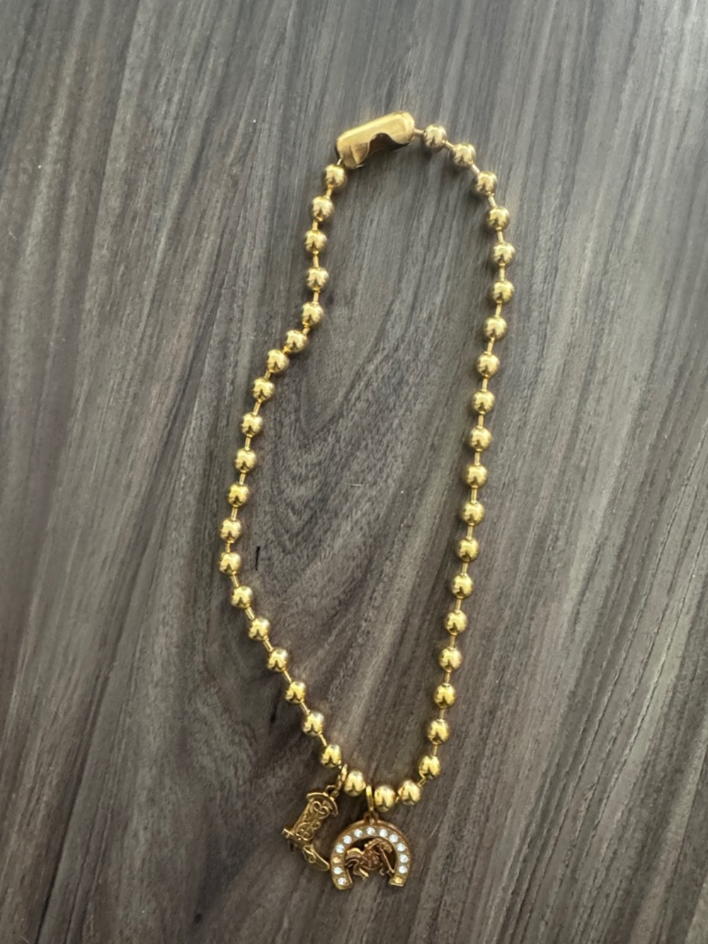 Gold Beaded Necklace with Crystal Horseshoe and Charm